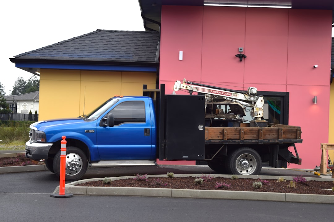 Jackson Gutters truck-mounted gutter roll-former forming a seamless run at a Jackson, TN home